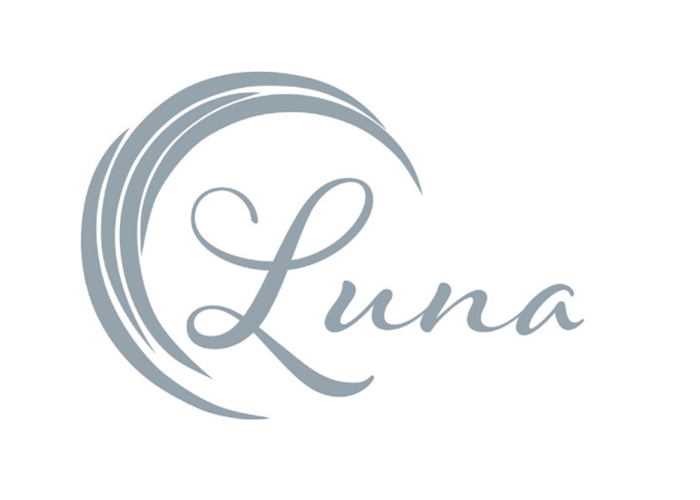 Luna House symbol showing a silver crescent moon.